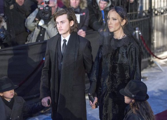 Celine Dion quitte l'église avec ses enfants, René-Charles, Eddy et Nelson après les funérailles de son mari René Angelil, à la Basilique Notre-Dame, vendredi 22 janvier 2016 à Montréal.