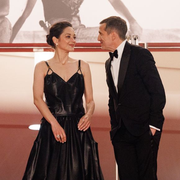 Marion Cotillard et Guillaume Canet - Descente des marches du film « Karma » lors du 79ème Festival International du Film de Cannes, le 15 mai 2026. © Jacovides-Moreau / Bestimage