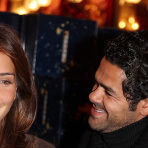 Jamel Debbouze et son épouse Mélissa Theuriau assistent au « Noël du Secours Populaire » organisé au Cirque d'hiver à Paris, en France, le 23 décembre 2009. Photo de Denis Guignebourg/ABACAPRESS.COM