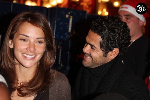 Jamel Debbouze et son épouse Mélissa Theuriau assistent au « Noël du Secours Populaire » organisé au Cirque d'hiver à Paris, en France, le 23 décembre 2009. Photo de Denis Guignebourg/ABACAPRESS.COM