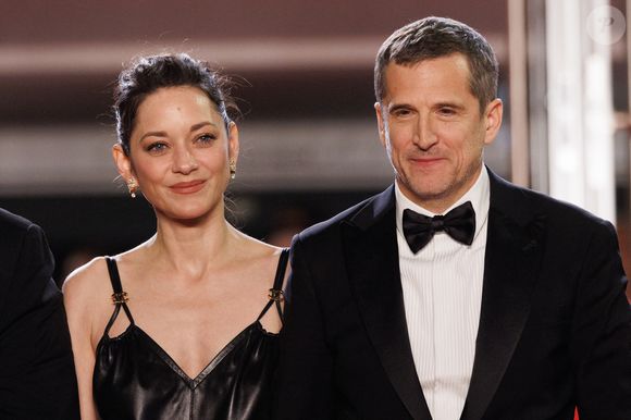 Marion Cotillard et Guillaume Canet - Descente des marches du film " Karma " lors du 79ème Festival International du Film de Cannes, le 15 mai 2026. © Jacovides-Moreau / Bestimage
