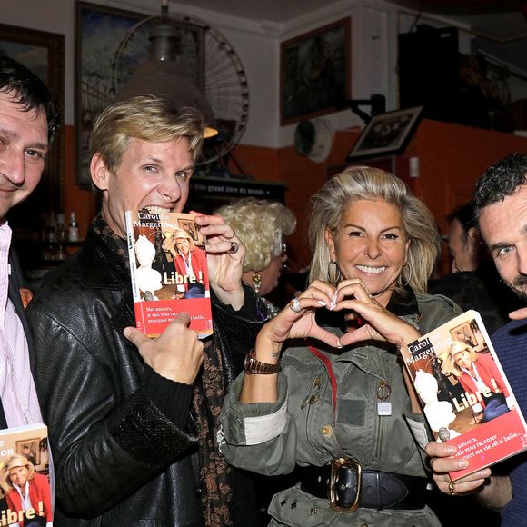 Exclusif -Caroline Margeridon, François Cases Bardina, Stéphane Vanhandenhoven  et François-Xavier Renou (Fransoa Superstar) - People à la soirée du lancement du livre "Libre !" de Caroline Margeridon à la Chope des Puces à Saint-Ouen. Le 8 novembre 2021
© Cédric Perrin / Bestimage