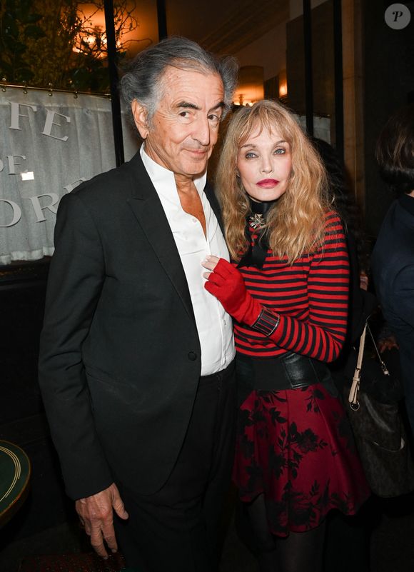 Bernard-Henri Lévy et Arielle Dombasle - Lancement du numéro 75 de la revue littéraire "La règle du jeu", avec pour thème "Comment lisez-vous ?", au Café de Flore à Paris. Le 16 février 2022 © Coadic Guirec / Bestimage