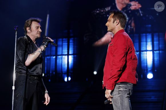 "Pour moi, c’était très difficile parce que j’avais des sentiments mélangés, en fait", a révélé David Hallyday, revenant alors sur la dichotomie des émotions qu’il ressentait durant cette période.

Exclusif - David Hallyday - Johnny Hallyday en concert au POPB de Bercy a Paris - Jour 2 de la tournee "Born Rocker Tour". Le 15 juin 2013