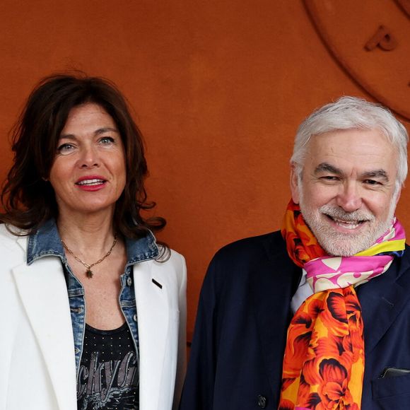 Cathy Bancarel et son compagnon Pascal Praud au village lors des Internationaux de France de tennis de Roland Garros 2024, à Paris, France, le 1er juin 2024. © Jacovides-Moreau/Bestimage