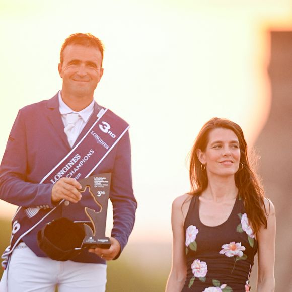 Olivier Perreau et Charlotte Casiraghi pendant la remise du Prix CSI5 lors de la 12ème édition Longines Paris Eiffel Jumping au pied de la Tour Eiffel sur le Champ-de-Mars à Paris, le 20 juin 2026.

© Perusseau / Veeren / Bestimage