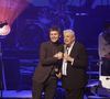 Le concert a été marqué par la présence de nombreuses personnalités venues célébrer ses 60 ans de carrière...
Enrico Macias et Thomas Sotto - Concert d’Enrico Macias pour sa tournée La Fête Continue ! dans la salle de spectacle Le Dôme de Paris - Palais des Sports à Paris, France, le 15 mars 2025. © Jack Tribeca/Bestimage