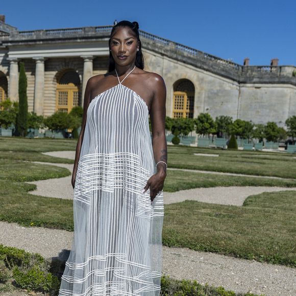 Aya Nakamura au photocall du défilé Jacquemus de la mode homme Printemps/Été 2026 dans le cadre de la Fashion Week de Paris dans les jardins de l’Orangerie à Versailles, France, le 29, 2025. © Olivier Borde/Bestimage