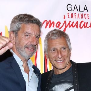 Michel Cymes et Nagui (président de la soirée) à la soirée de gala Enfance Majuscule à Salle Gaveau à Paris, le 7 octobre 2024.
© Bertrand Rindoff / Bestimage