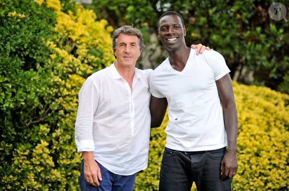 François Cluzet et Omar Sy au Festival du film francophone d'Angoulême, en 2011. © Guillaume Gaffiot /Bestimage
