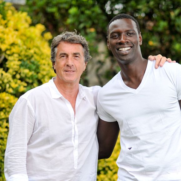 François Cluzet et Omar Sy au Festival du film francophone d'Angoulême, en 2011. © Guillaume Gaffiot /Bestimage