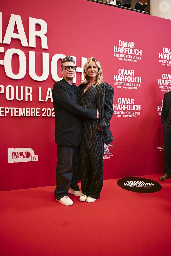 Marc Lavoine et sa compagne Adriana Karembeu au photocall du "concerto pour la paix" de Omar Harfouch au Théâtre des Champs-Elysées à Paris le 18 septembre 2024.

© Perusseau / Tribeca / Bestimage