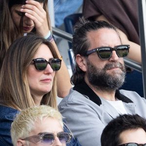 Marie Portolano et son mari Grégoire Ludig en tribunes du match de football Ligue 1 McDonald's opposant le Paris Saint-Germain (PSG) au FC Lorient (2-2) au Parc des Princes à Paris, France, le 2 mai 2026. © Bestimage