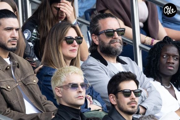 Marie Portolano et son mari Grégoire Ludig en tribunes du match de football Ligue 1 McDonald's opposant le Paris Saint-Germain (PSG) au FC Lorient (2-2) au Parc des Princes à Paris, France, le 2 mai 2026. © Bestimage