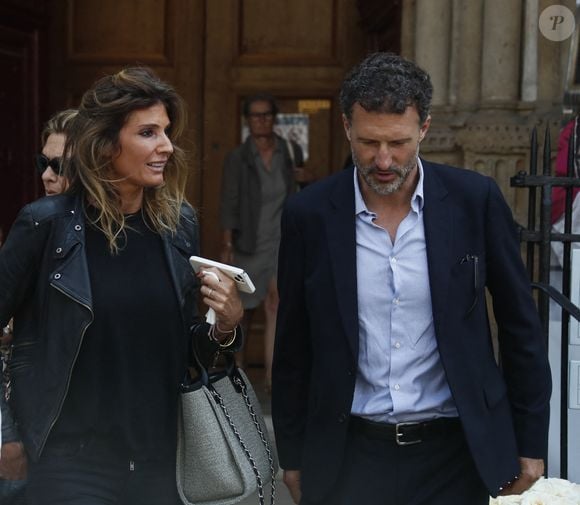 Caroline Ithurbide et son mari Polo Anid - Sorties des obsèques de Philippe Labro dans l'église de Saint-Germain-des-Prés à Paris le 13 juin 2025. © Dominique Jacovides - Christophe Clovis / Bestimage
