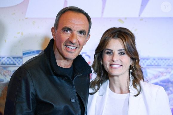 Nikos Aliagas et Faustine Bollaert lors de l'avant-première du Super Grand Prix au cinéma Grand Rex à Paris, France, le 28 septembre 2025. Photo par Aurore Marechal/ABACAPRESS.COM