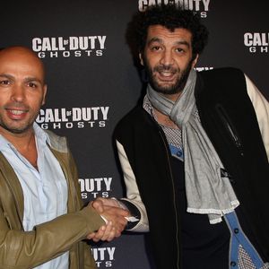 Eric Judor et Ramzy Bedia - Soiree de lancement du jeu "Call of Duty Ghost" au Palais de Tokyo à Paris le 4 novembre 2013. Marc Ausset Lacroix / Bestimage