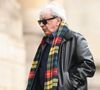 En look sombre et écharpe colorée.

Hervé Vilard aux obsèques Georgette Lemaire en l'église Saint-Roch à Paris, France, le 14 janvier 2026. © Pierre Perusseau/Bestimage