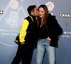 L'humoriste était là pour faire la promotion du Marsupilami. Et sur le tapis rouge il a multiplié les gestes tendres envers sa femme. 

Jamel Debbouze et sa femme Mélissa Theuriau - Tapis rouge lors du 29ème Festival International du Film de Comédie de l'Alpe d'Huez le 21 Janvier 2026. © Dominique Jacovides/Bestimage