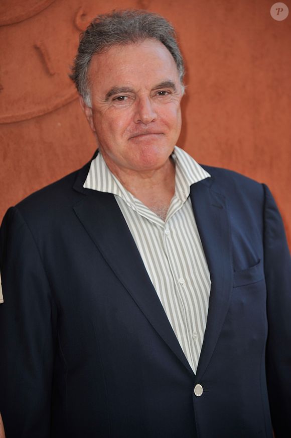 Derrière ses publicités cultes et son image populaire, l’homme d’affaires se distingue par une philosophie managériale bien précise : la compétence avant tout. 

Alain Afflelou - People au village des Internationaux de France de tennis de Roland Garros à Paris, le 8 juin 2014. Gorassini / Jacovides / Bestimage