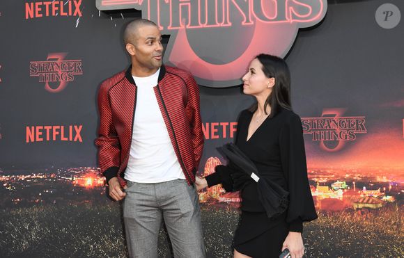 Tony Parker et sa femme Axelle Francine à la première de la série Netflix "Stranger Things - Saison 3" au cinéma Le Grand Rex à Paris, le 4 juillet 2019. © Guirec Coadic/Bestimage