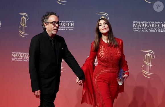 Tim Burton, Monica Bellucci au photocall de la cérémonie d'hommage à Sean Penn lors de la deuxième journée du 21e Festival international du film de Marrakech, le 30 novembre 2024 à Marrakech, Maroc. © Dominique Jacovides/Bestimage