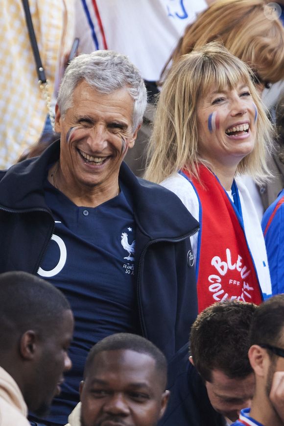 Nagui et sa femme Mélanie Page - Célébrités dans les tribunes du match du groupe D de l'Euro 2024 entre l'équipe de France face à l'Autriche (1-0) à Dusseldorf en Allemagne le 17 juin 2024. © Cyril Moreau/Bestimage