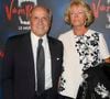 Surnommé "le tigre de papier glacé", il a ensuite créé des succès incontournables comme "Femme Actuelle", "Capital" ou "Voici".

Axel Ganz et sa femme Renate - Générale de la comédie musicale "Le Bal des Vampires" au Théâtre Mogador à Paris, le 16 octobre 2014.

COADIC GUIREC / BESTIMAGE