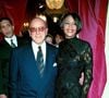 Tout au long de ses sept décennies de carrière, il a découvert et produit des icônes de la musique telles que Janis Joplin, Bruce Springsteen, Aretha Franklin ou encore Alicia Keys.

Whitney Houston et Clive Davsi célèbrent la sortie de l'album "My love is your love" à Londres le 14 novembre 1999. Bestimage