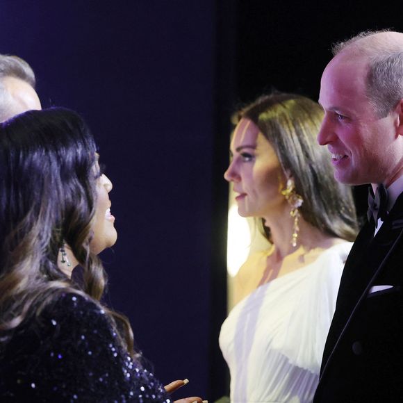 Le prince William, Kate et leurs enfants se sont envolés pour l'île il y a quelques jours, juste après que le palais de Kensington ait annoncé que le couple ne participerait pas à la cérémonie. 

Le prince William, prince de Galles, et Catherine (Kate) Middleton, princesse de Galles, arrivent à la 76ème cérémonie des British Academy Film Awards (BAFTA) au Royal Albert Hall à Londres, le 19 février 2023.
Photoshot/Panoramic/Bestimage