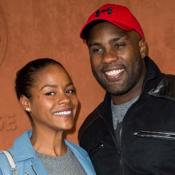Depuis le 10 septembre, il est aux commandes de "Pour le meilleur et à l'aveugle" sur Netflix. 

Teddy Riner et sa compagne Luthna Plocus au village lors des internationaux de tennis de Roland Garros à Paris, France, le 5 juin 2019. Photo par JB Autissier / Panoramic / Bestimage