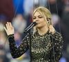 La chanteuse Louane (Louane Emera), représentante de la France au concours de l'Eurovision, interpréte pour la première fois son titre Maman, en hommage à sa mère décédée lorsqu'elle avait 17 ans, devant les 80 000 spectateurs, suspendue sur une plateforme, plusieurs mètres au-dessus de la pelouse et des musiciens, du Stade de France à la mi-temps du match du Tournoi des Six Nations opposant la France à l'Écosse, à Saint-Denis, Seine Saint-Denis, France, le 15 mars 2025. © Cyril Moreau/Bestimage