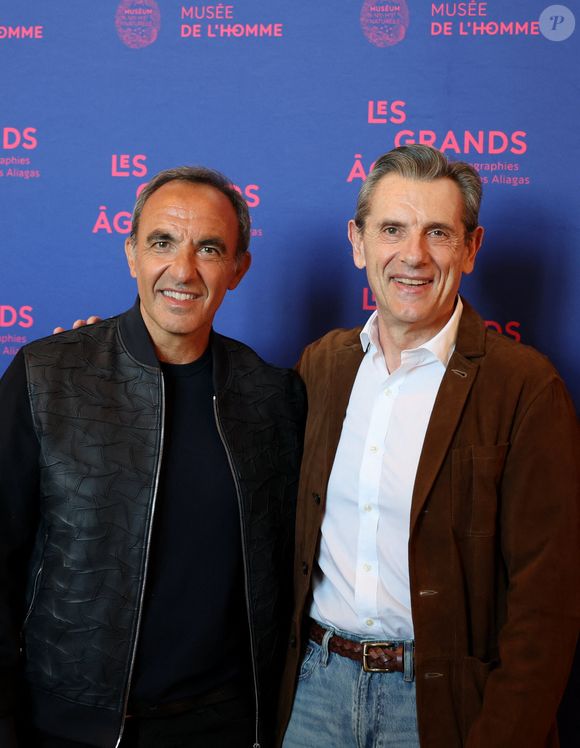 Nikos Aliagas et Patrick Chapuis : Président de Canon France - Vernissage de l'exposition "Les grands âges", photographies de Nikos Aliagas au musée de l'Homme à Paris le 7 avril 2026. © Dominique Jacovides/Bestimage