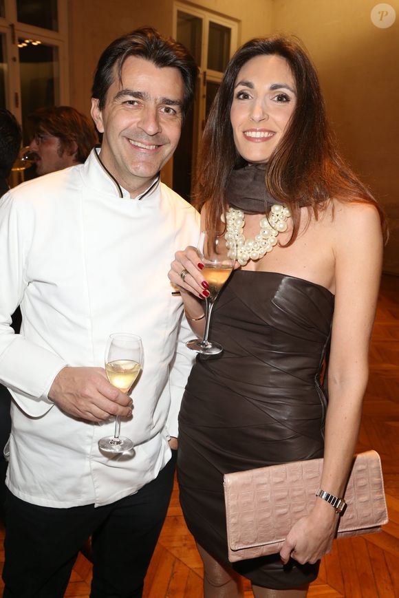 Exclusif - Yannick Alleno et sa compagne Laurence Bonnel - 18eme edition de la vente aux encheres des Sapins de Noel des createurs a l'hotel Salomon de Rothschild a Paris le 9 decembre 2013. La somme recoltee sera reversee au profit de l'association "AVEC" du professeur David Khayat.