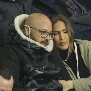 Vitaa (enceinte de son 3ème enfant) et son mari Hicham Bendaoud - People lors de la huitième de finale aller de la Ligue des champions entre le PSG et le Real Madrid au Parc des Princes à Paris le 15 février 2022. © Cyril Moreau/Bestimage