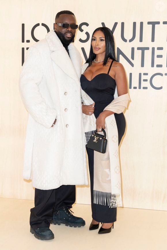 Maître Gims et sa nouvelle compagne - Photocall du Défilé de mode Louis Vuitton Collection Hommes Automne Hiver Printemps-Été dans le cadre de la Fashion Week de Paris, France, le 20 janvier 2026.
 © Olivier Borde / Bestimage