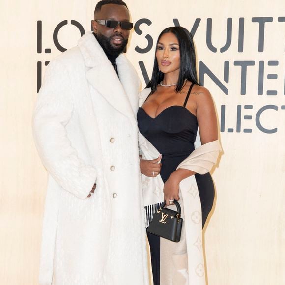Maître Gims et sa nouvelle compagne - Photocall du Défilé de mode Louis Vuitton Collection Hommes Automne Hiver Printemps-Été dans le cadre de la Fashion Week de Paris, France, le 20 janvier 2026.
 © Olivier Borde / Bestimage