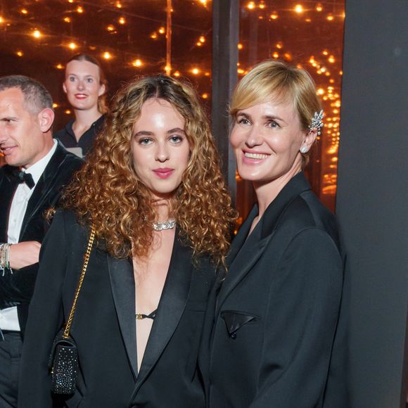 Judith Godrèche et sa fille Tess Barthelemy, - Dîner "Women in Motion" par le groupe Kering, Place de la Castre, lors du 77ème Festival International du Film de Cannes le 19 mai 2024.  
©API / BESTIMAGE