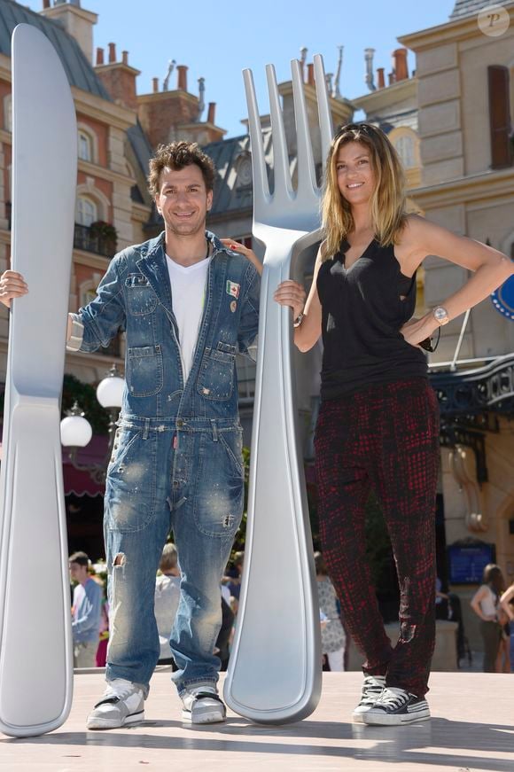 Michaël Youn et sa femme Isabelle Funaro lors de la présentation en avant-première de la nouvelle attraction "Ratatouille : L'aventure totalement toquée" à Disneyland Paris à Marne-la-Vallée, le 21 juin 2014. (COADIC GUIREC / BESTIMAGE).