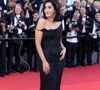 Pour sa montée des marches, la compagne de Tahar Rahim a misé sur une robe sirène noire Guy Laroche issue de la collection automne/hiver 2002.

Leïla Bekhti - Montée des marches du film " La vénus électrique " pour la cérémonie d'ouverture du 79ème Festival International du Film de Cannes, le 12 mai 2026. 

© Olivier Borde /Bestimage