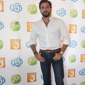 Olivier Minne au photocall de la rentrée TV des chaînes Canal J, Gulli et Tiji, au restaurant "La Gare" à Paris, le 30 juin 2016.
© Pierre Perusseau/Bestimage
