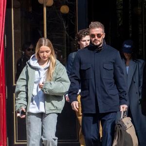 David Beckham et sa fille Harper - Les Beckham quittent leur hôtel La Réserve, à Paris, le 8 mars 2025.  GOFF INF / BESTIMAGE