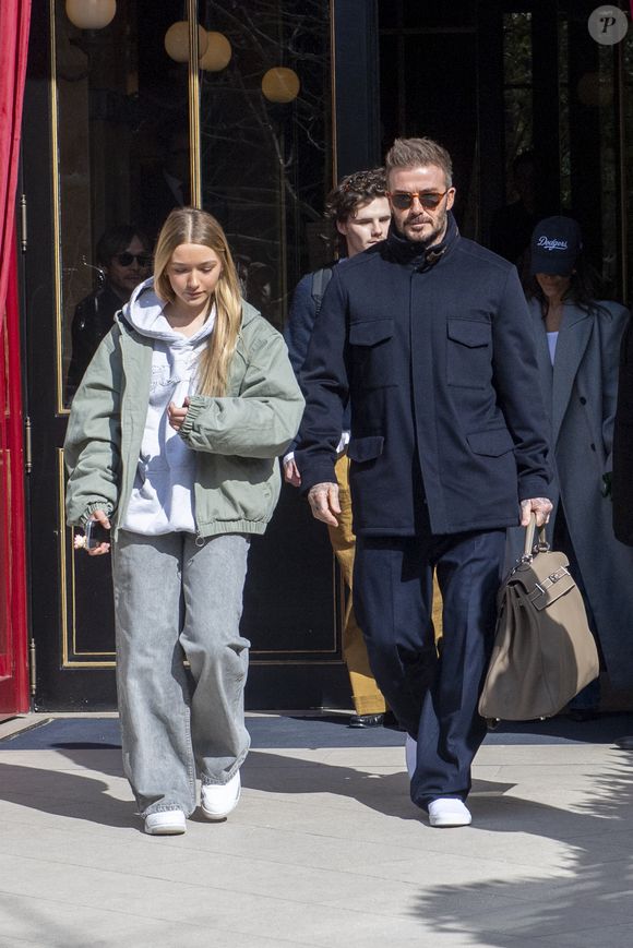 David Beckham et sa fille Harper - Les Beckham quittent leur hôtel La Réserve, à Paris, le 8 mars 2025.  GOFF INF / BESTIMAGE