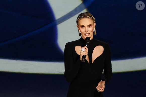 L'actrice Charlize Theron se produit lors d'une cérémonie d'ouverture des Jeux Olympiques d'hiver 2026 au stade San Siro. 

©Peter Kovalev/TASS