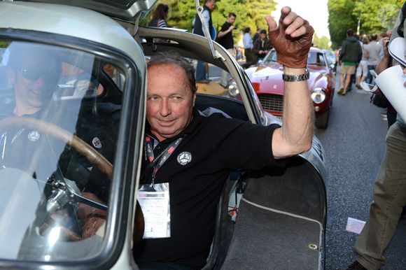 Jochen Mass participant à l'édition 2014 de la course de régularité Mille Miglia pour voitures classiques et anciennes, à Brescia, Italie, le 15 mai 2014. Photo by Olycom/ABACAPRESS.COM