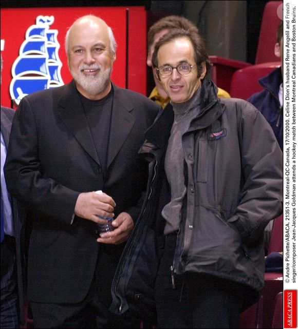 Le mari de Céline Dion, René Angelil, et le chanteur/compositeur français Jean-Jacques Goldman assistent à un match de hockey entre les Canadiens de Montréal et les Bruins de Boston. le 17 octobre 2000 © André Pichette/ABACA