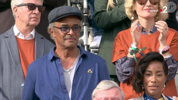Yannick Noah et sa compagne Malika dans les tribunes de Roland Garros. Capture France 2