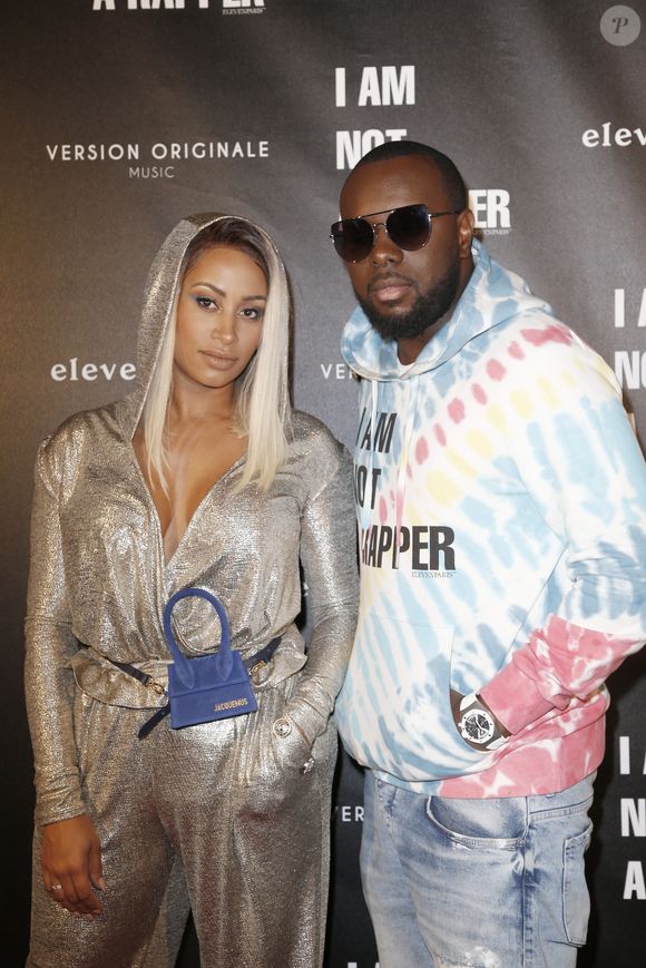 Gims et Demdem Djuna lors de la soirée de lancement de la collection capsule "I'm not a rapper" de la marque Elevenparis, à Paris, France, le 11 avril 2019.