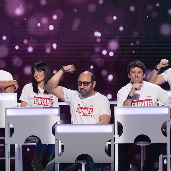Exclusif - Liane Foly, Slimane, Jenifer Bartoli, Kad Merad, Patrick Bruel, Philippe Lacheau, Christophe Willem - Enregistrement de l'émission "Les enfoirés jouent le jeu", qui sera diffusée le 30 novembre en prime time sur TF1. Le 18 novembre 2019
© Cyril Moreau / Bestimage
A l'occasion des 30 ans de la troupe des Enfoirés et de la sortie du Coffret " Les 30 ans des Enfoirés 1989-2019 " au profit des Restos du Cœur, des Enfoirés et des surprises se retrouvent autour de N.Aliagas pour une grande soirée de jeux.
Des jeux en cascades, des questions en rafales, des karaokés, des blind tests, des mimes…    
Et une grande finale pour déterminer, de tous les Enfoirés présents, qui sera le grand vainqueur de la soirée.
