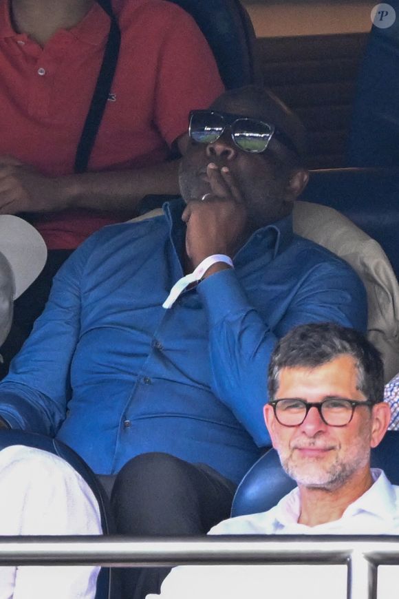 “Je ne suis pas parti comme un voleur !”, assure Basile Boli
Basile Boli en tribunes pendant l'épreuve finale de football opposant la France à l'Espagne lors des Jeux Olympiques de Paris 2024 (JO) au Parc des Princes, à Paris, France, le 9 août 2024. © Jacovides-Perusseau/Bestimage